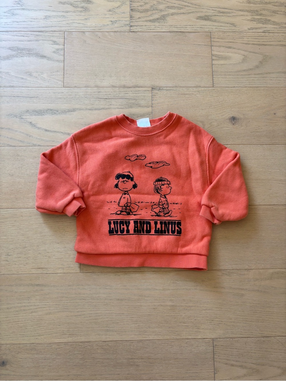 Zara orange peanut Lucy and Linus print sweatshirt, size 4Y